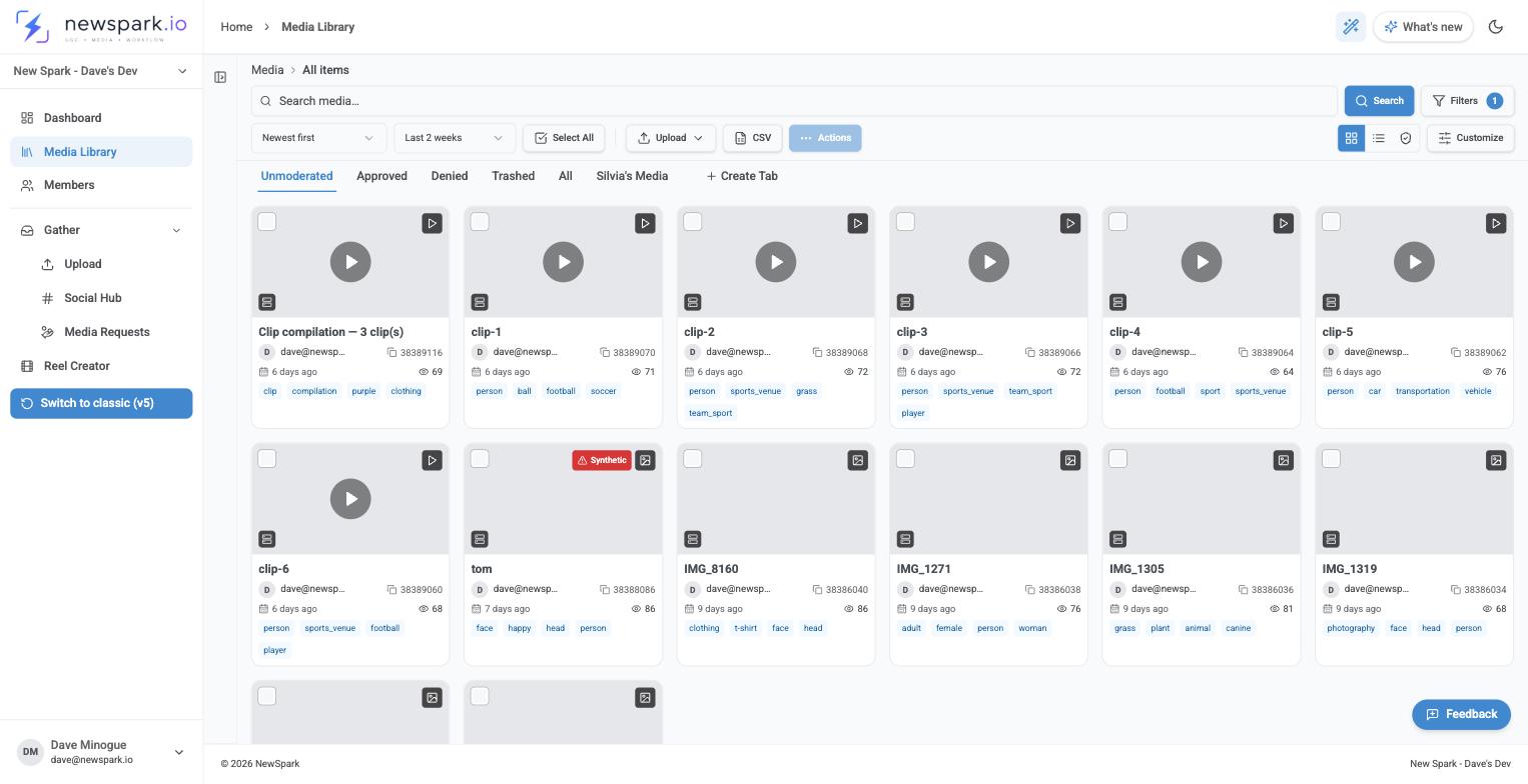 NewSpark Media Library grid showing uploaded video and photo assets with automatically generated tags like person, football, sports_venue, and clothing